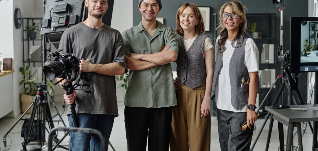 Portrait of Smiling Crew at Studio