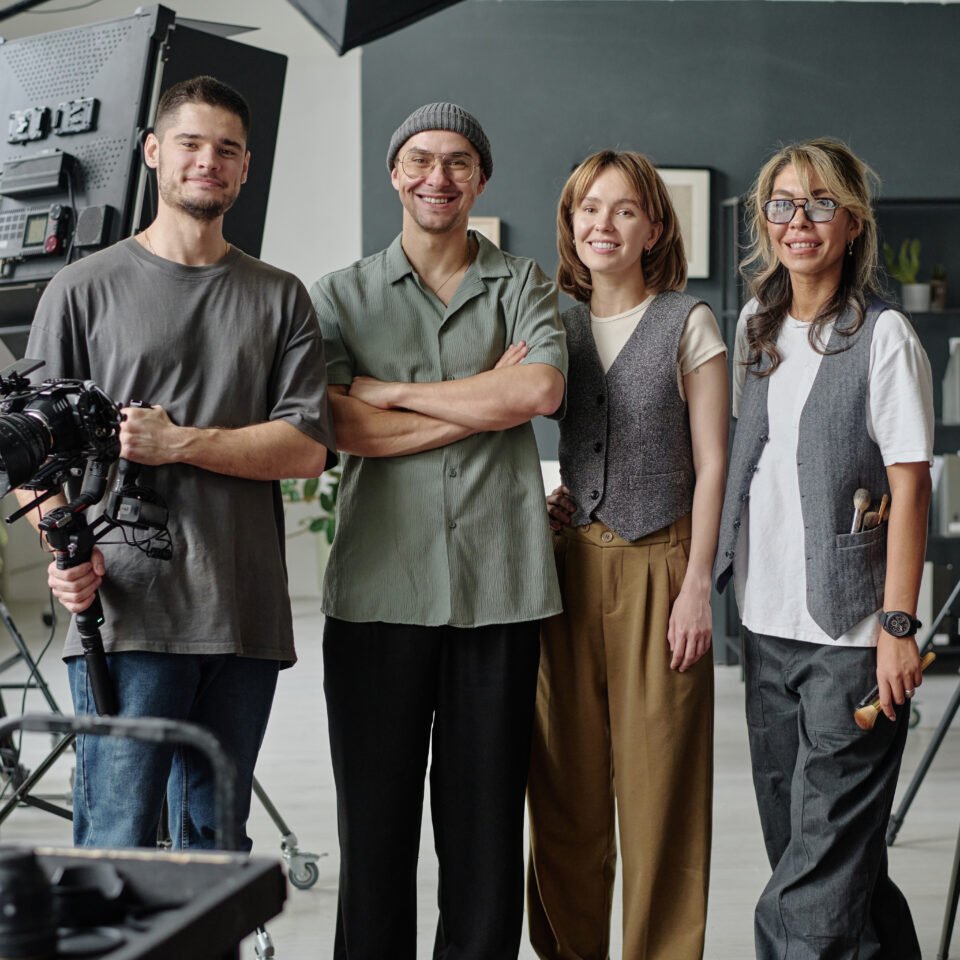 Portrait of Smiling Crew at Studio